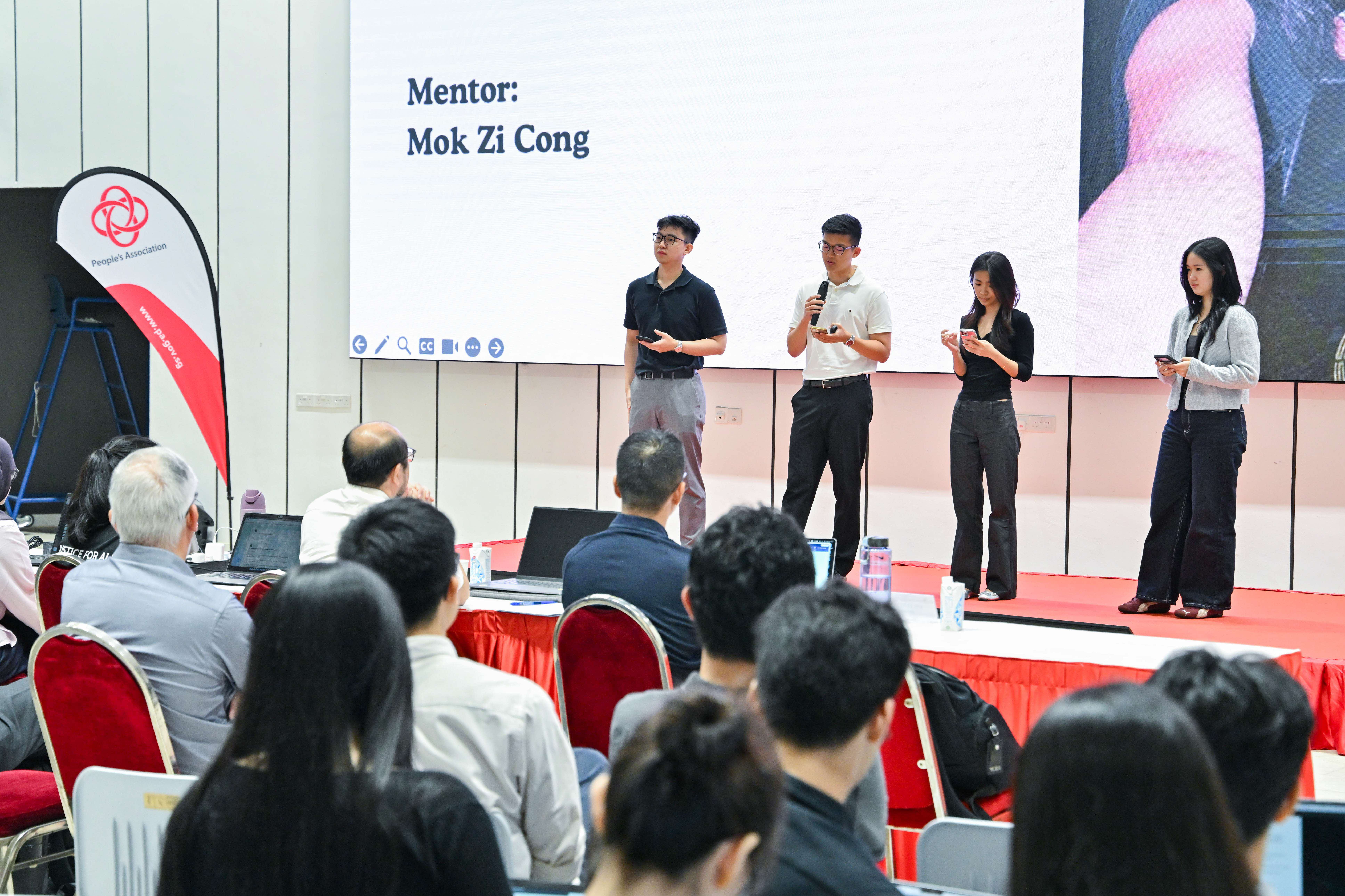 Four students under mentor Mok Zi Cong presenting